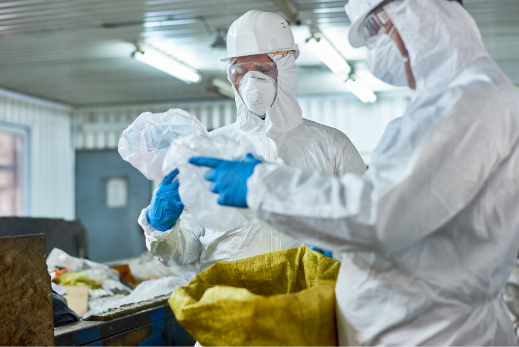 SCU Services workers-sorting-plastic-on-modern-waste-process Expert Biohazard and Hoarding Cleanup Services in West Virginia  